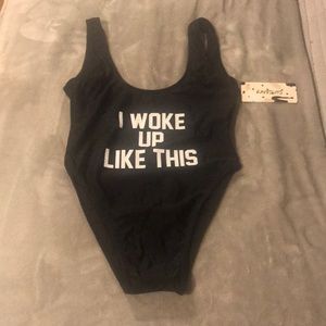 Never worn Black one piece